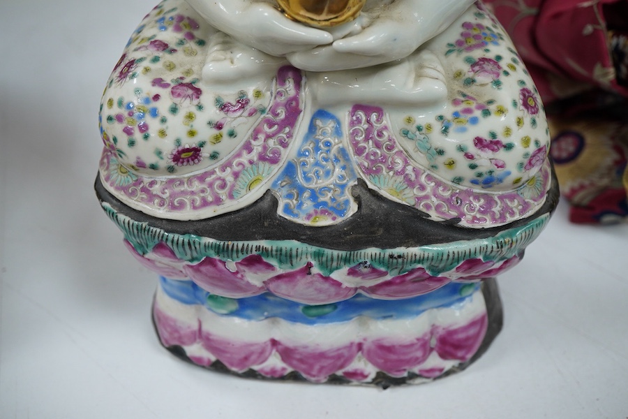 A Chinese famille rose figure of Buddha, Republic period, 30cm